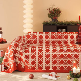 Kühner roter, rautenförmiger Sofabezug für ein modernes, stilvolles Umstyling im Wohnzimmer