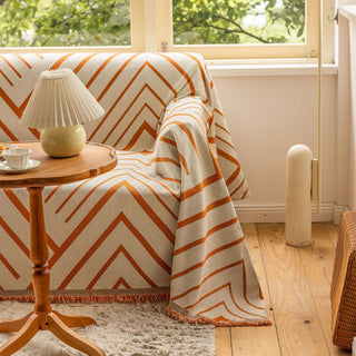 Sofabezug mit geometrischem Rostmuster und Chevron